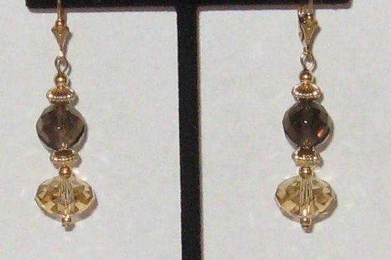 Smokey quartz and citrine. with 14 kt gold filled findings. This is not a one only but, I have a limited amount of them.  A great after the wedding earring for the bridesmaids.
