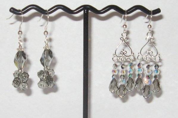 The earring on the right has already been described. The earring on the left is SWAROVSKI black diamond in some of the newer shapes.  Sterling silver findings.  There is no limit to the amount that can be made of this earring.