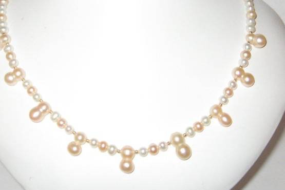 This is a fresh water pearl necklace featuring 
