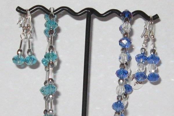 A inexpensive pair of earrings and a bracelet made for a prom girl but, also could be a inexpensive set for a bridesmaid.
Not Swarovski  but, a beautiful shade.  The description is for the set on the right only.