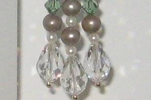 Taupe dyed pearls and a light green crystal.  This is a example for a bride who is trying to decide her shades.  Sometimes you have to see it together to know what you would like.