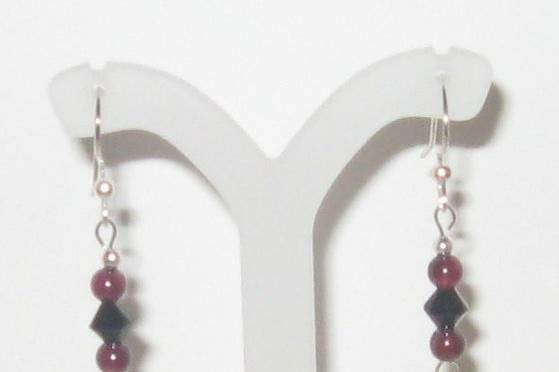 Game cock earring created with Garnet, SWAROVSKI crystal, AND STERLING SILVER.