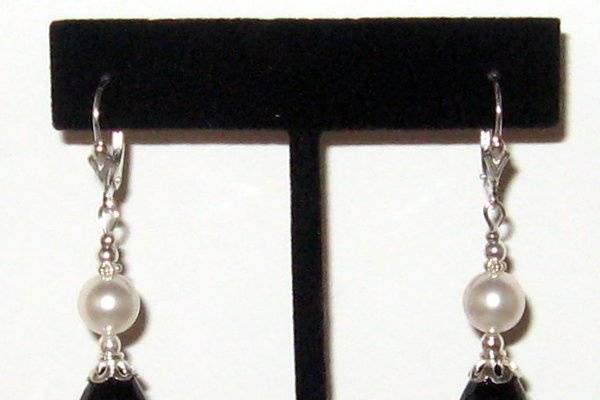 Onyx and SWAROVSKI pearls. Sterling silver.