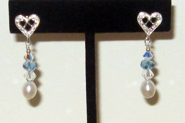 Fresh water pearls with London blue, micro faceted blue topaz. Rhinestone studded hearts posts.