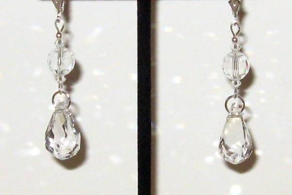 All clear Swarovski crystal in a new drop shape. All sterling silver metals.