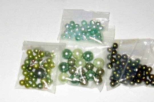 Shades of greens.  All of these pearls were bought to add to a brides jewelry, or for bridesmaids jewelry.