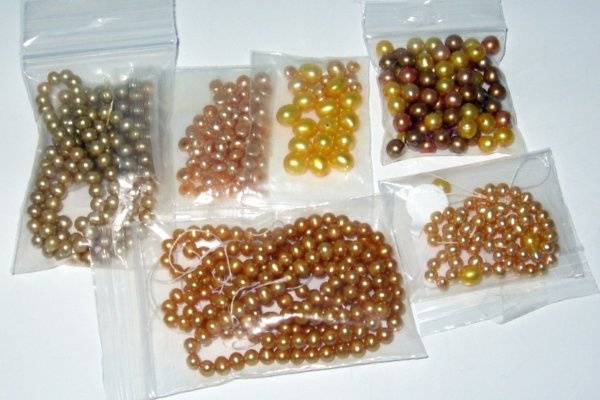 Yellows and golds fresh water pearls. Top quality.