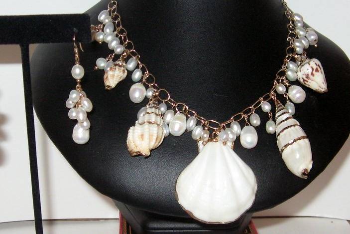 This necklace set was also designed for the beach bound bride.  Look at all the gold trim shells and lots of fresh water pearls.   This set has SOLD but I can make something similar to it if you like.  The metal was 14 kt gold filled.  Chain also 14 kt gold filled.