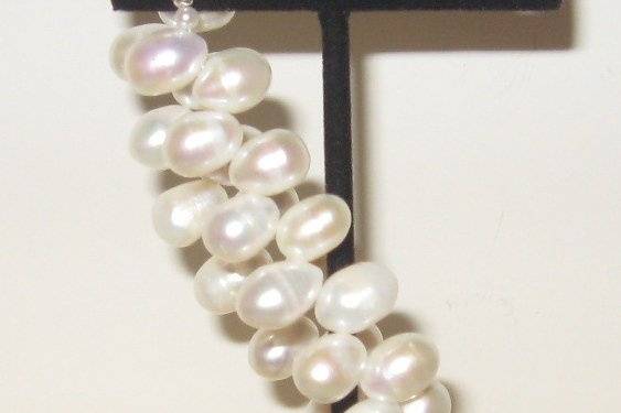 Top drilled rice pearls that are 9.5 mm in size. The toggle is sterling silver.