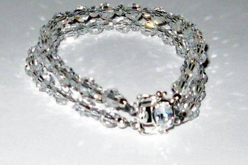 Swarovski crystal in all clear bracelet.  BEAUTIFUL oval clasp with a CZ inside.  A double safety completes this sterling silver bracelet.