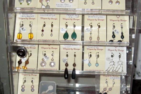 Just a few of our gemstone earrings. Malachite, Citrine, Blue topaz, Smokey quartz, Prasolite, Larimar, Onyx, London blue topaz, Garnet, Peridot.  this is just a small sample of the gemstones we have.