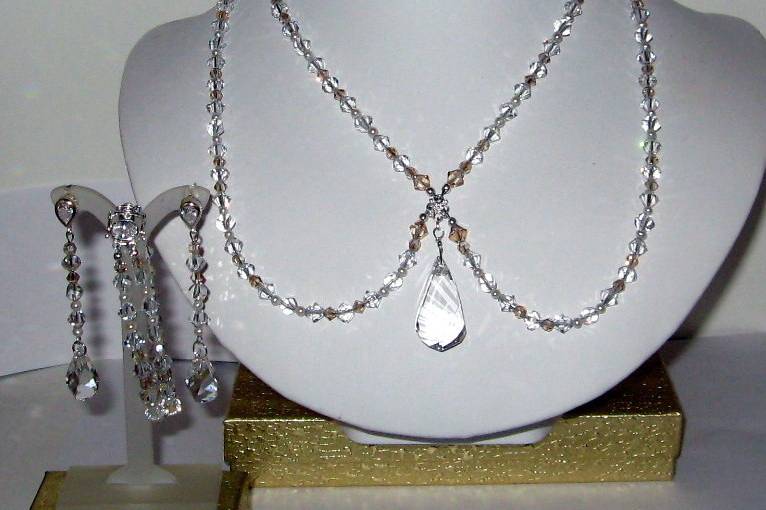 The necklace, and earrings that Desirae wore in the previous pictures.