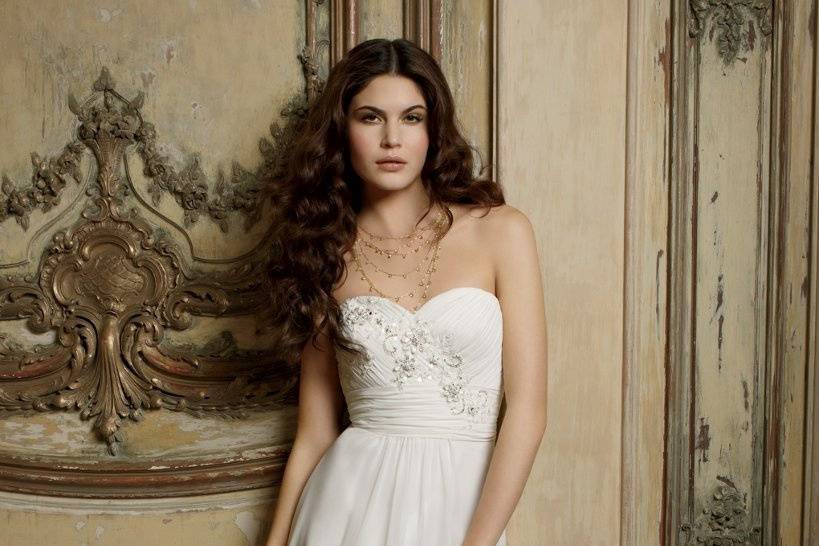 41790-7233WThe wedding dress to have for the Islands… Strapless chiffon wedding dress with shirred bodice, beaded appliques, zipper back, detachable chiffon shoulder straps, and a chapel length train.