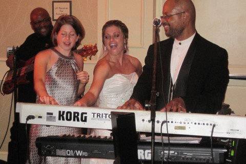 Getting a helpful hand from the BRIDE and MOH!