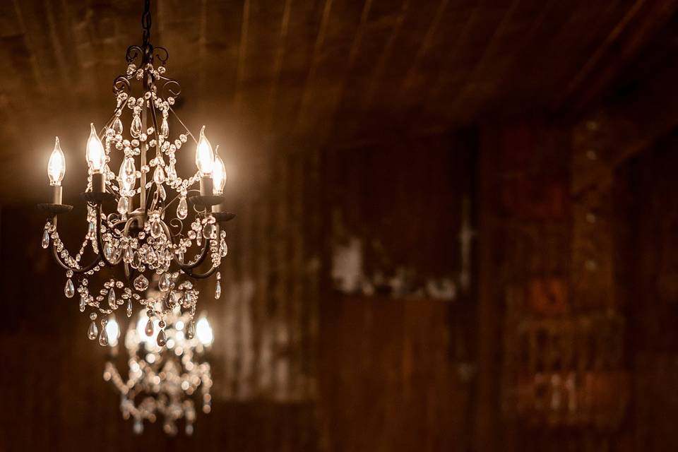 Metal wall with chandelier