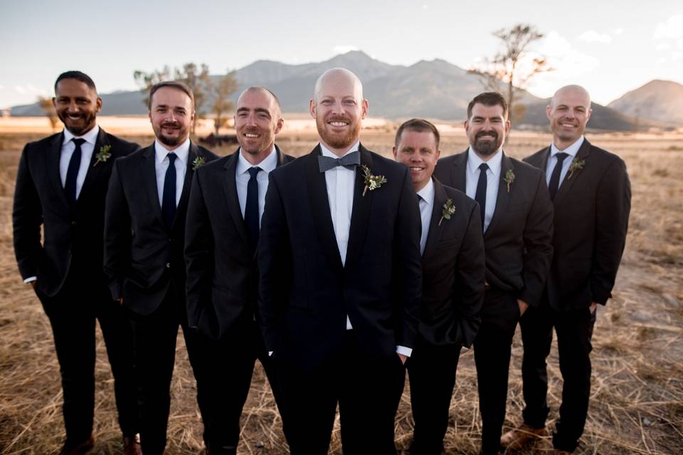 Groomsmen in field