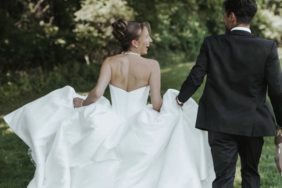 Couple running & laughing