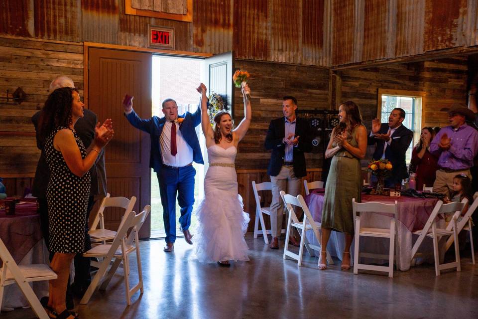 A happy wedding entrance