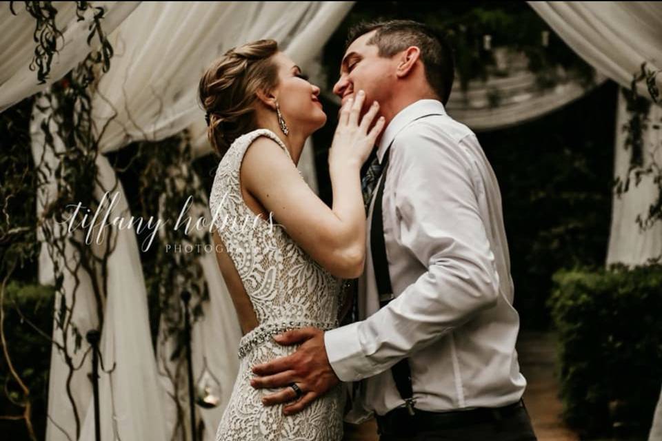 Newlyweds about to kiss