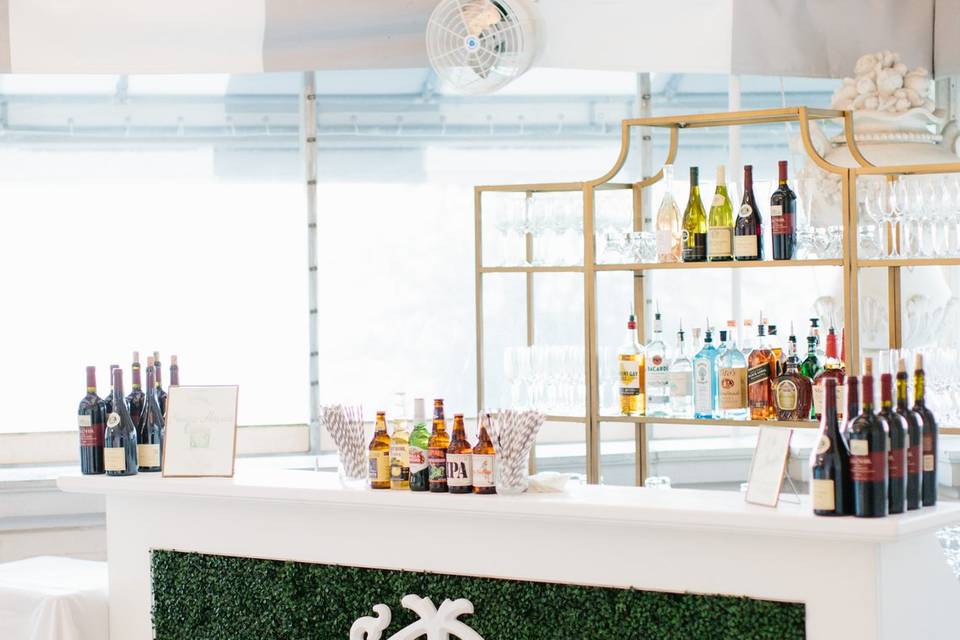 White bar with gold shelving