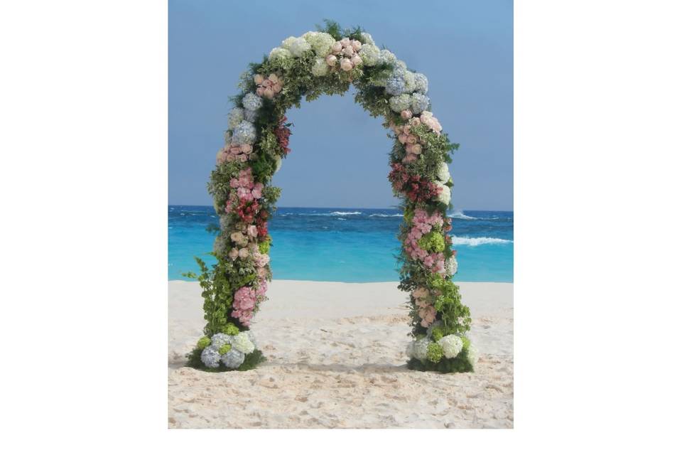 Richly decorated floral arch