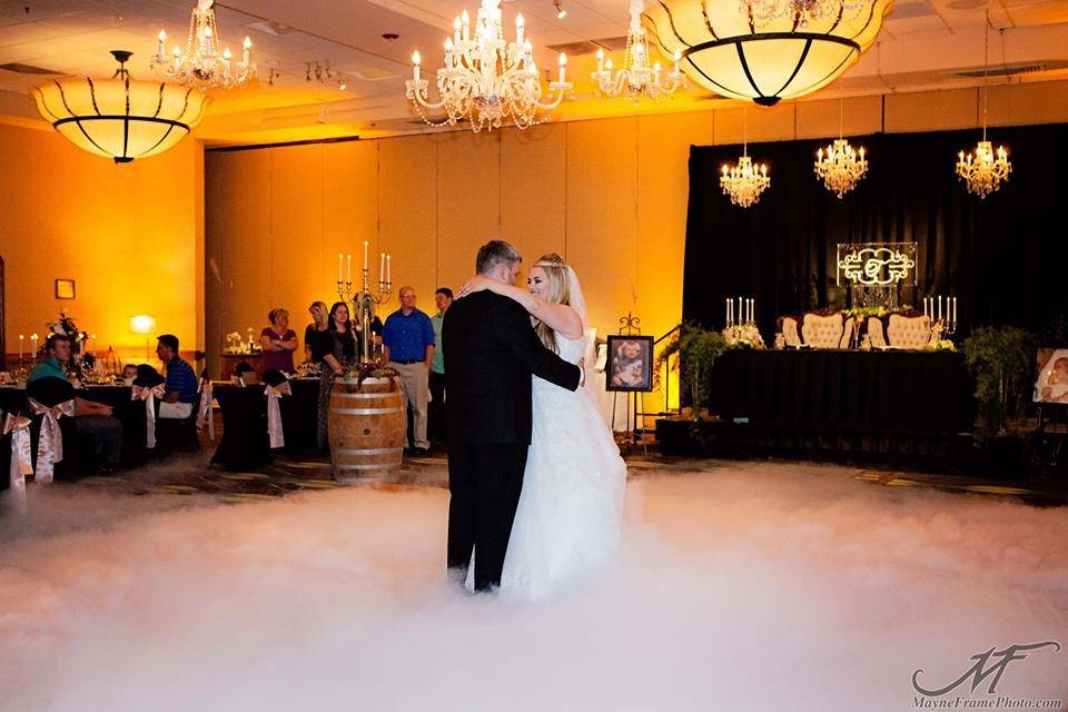 Couple and wedding party dancing