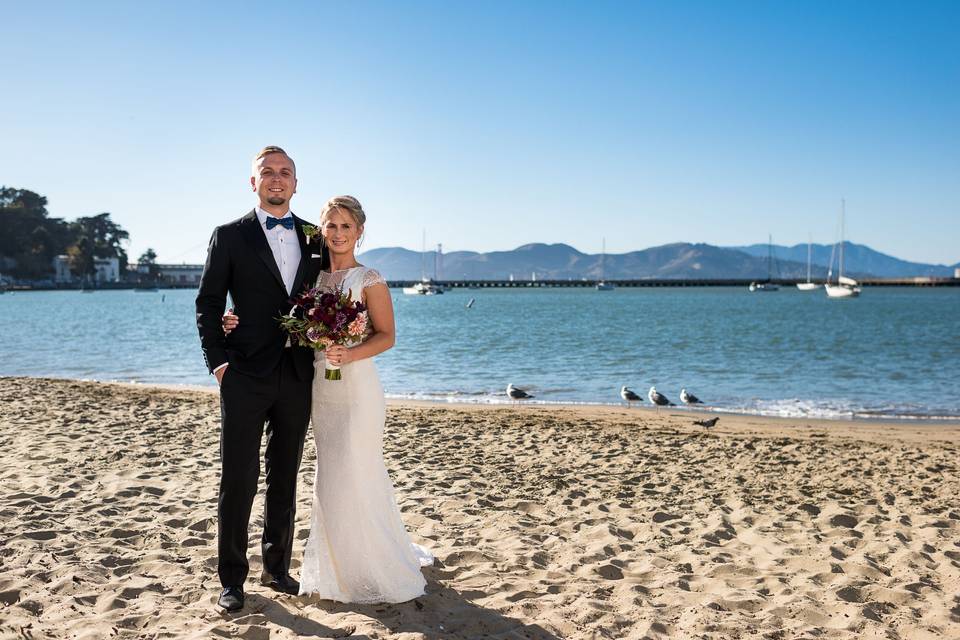 Newlyweds by the beach