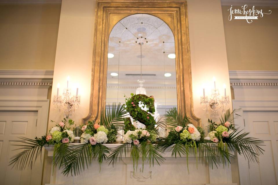 Floral decor on the fireplace | Photo Credit: Jen Hopkins Photography