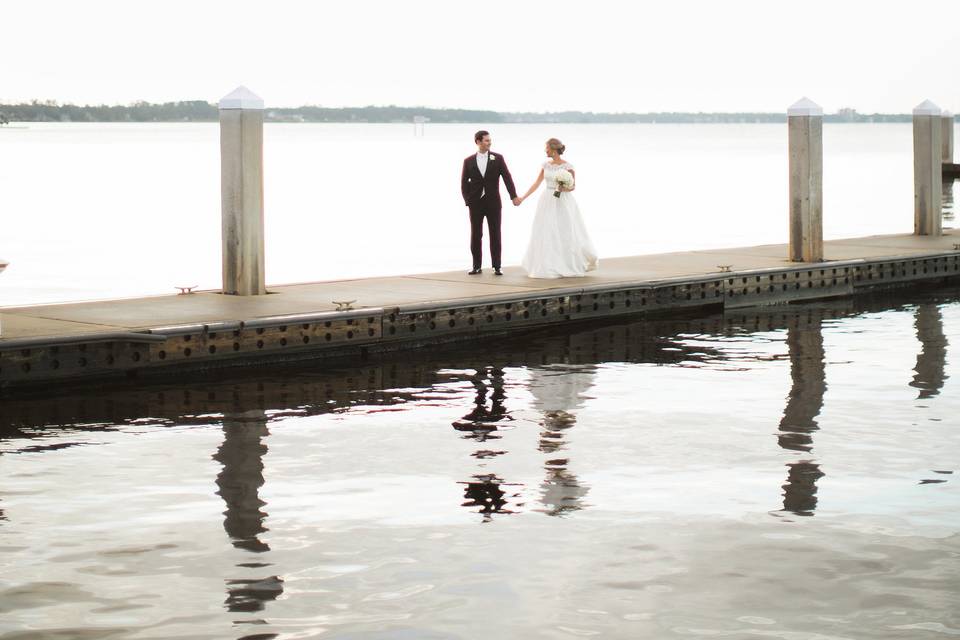 Newlyweds on the dock | Credit: Brooke Images.