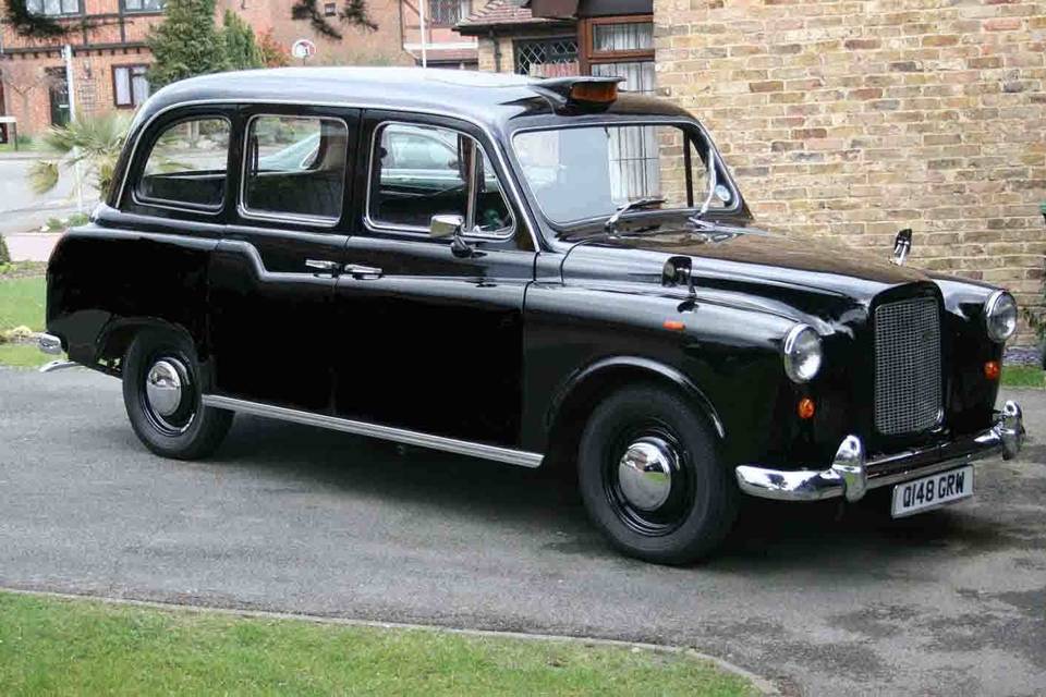 A1 OF A KIND VINTAGE LONDON BLACK TAXI CAB COMPANY