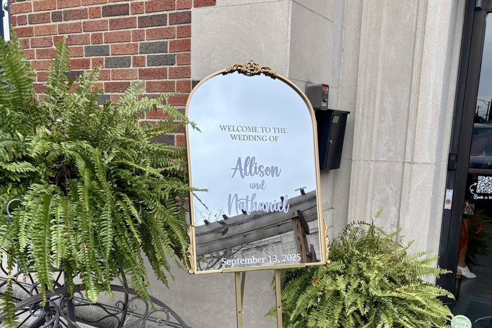 Gold welcome mirror