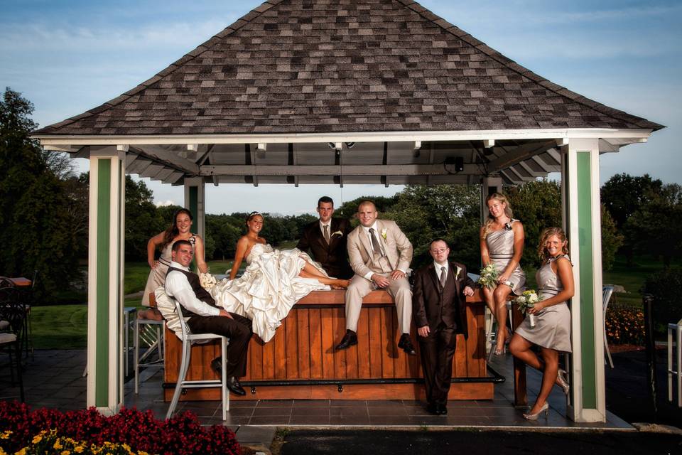 The couple with the bridesmaids and groomsmen