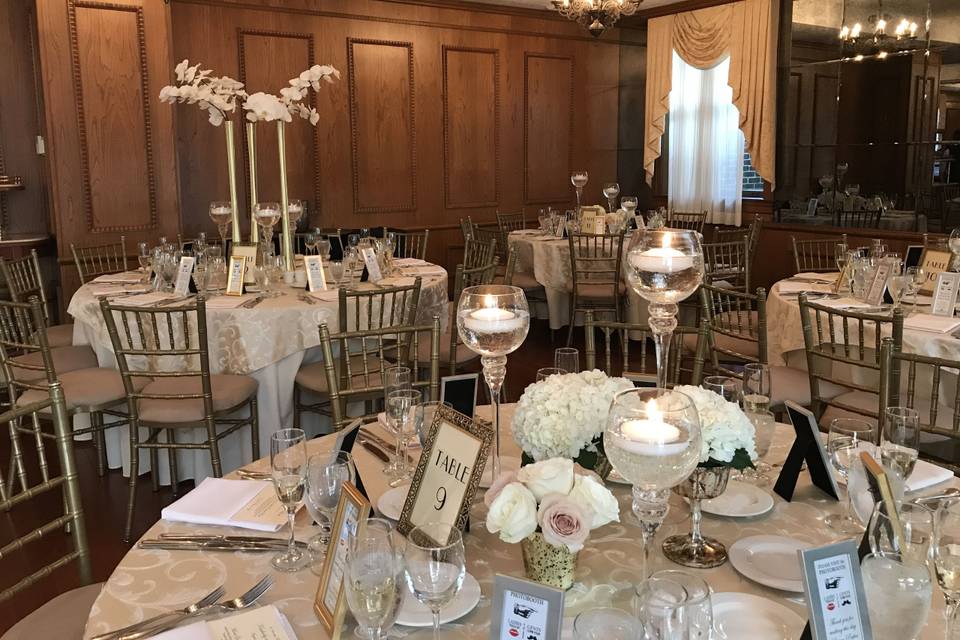 Beautiful florals and candle centerpieces at the De Seversky mansion