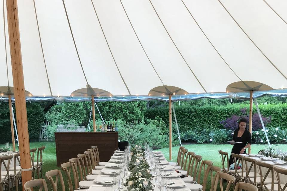 Eucalyptus table garlands at a backyard wedding in South Hampton