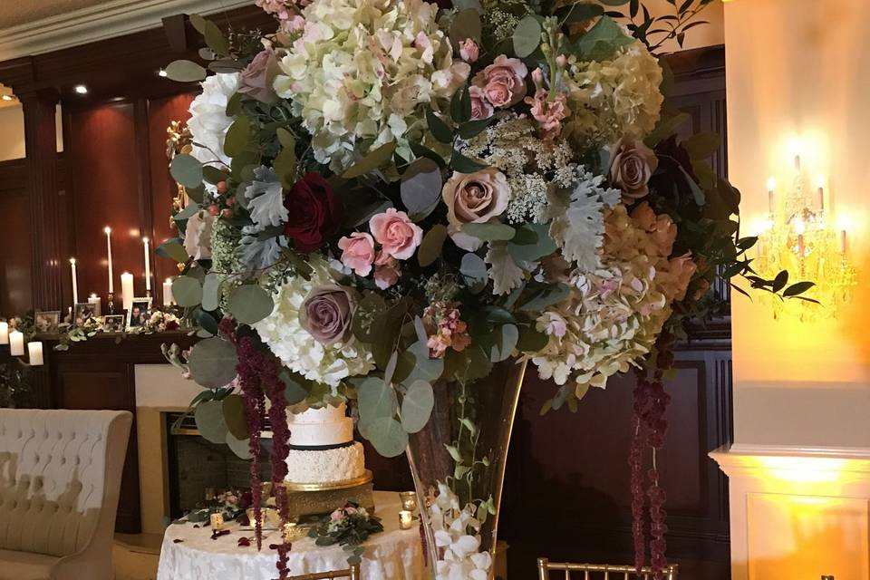 Tall and lush with greenery centerpieces in the Gable room at The Inn at New Hyde Park