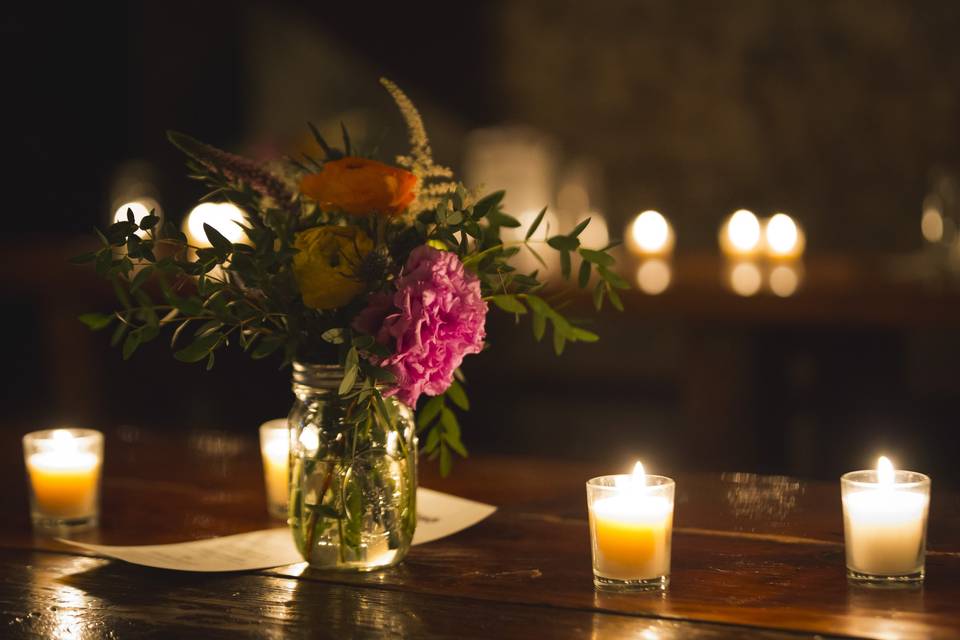 Floral centerpiece and candles | Beer Garden Centerpieces