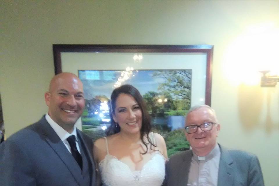 Newlyweds and the officiant