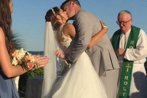 Groom kisses his bride