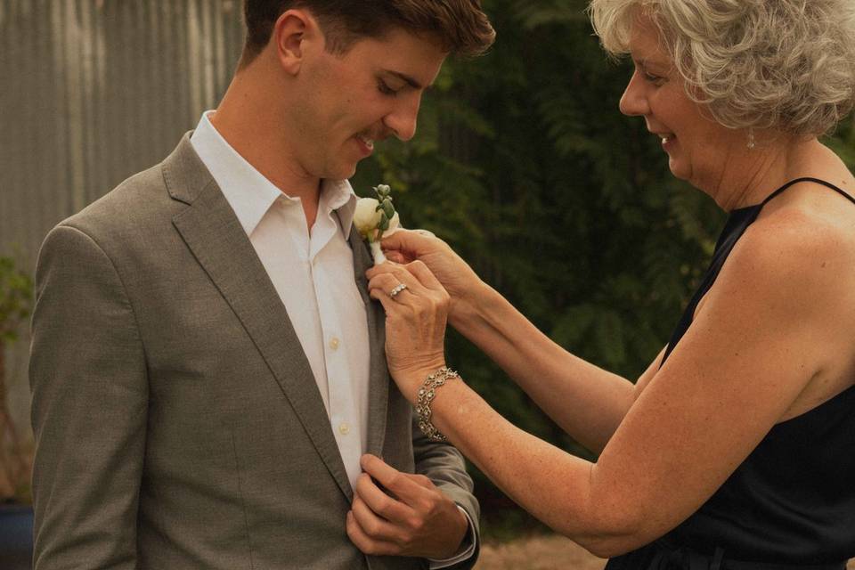 Mom getting groom ready