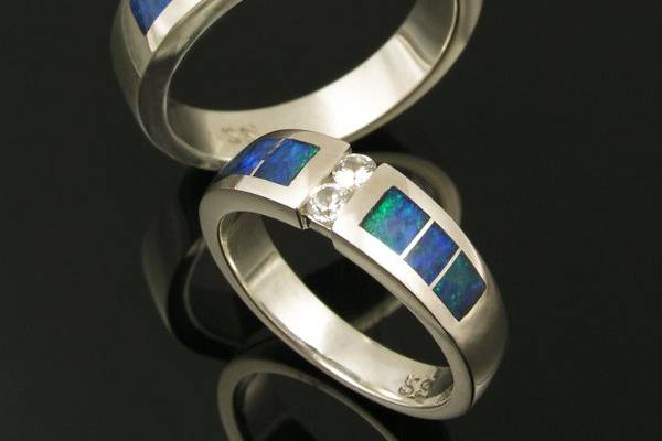 His and hers Australian opal wedding ring set with white sapphire accents.  This opal ring set is also available in his and his or hers and hers set combinations.
