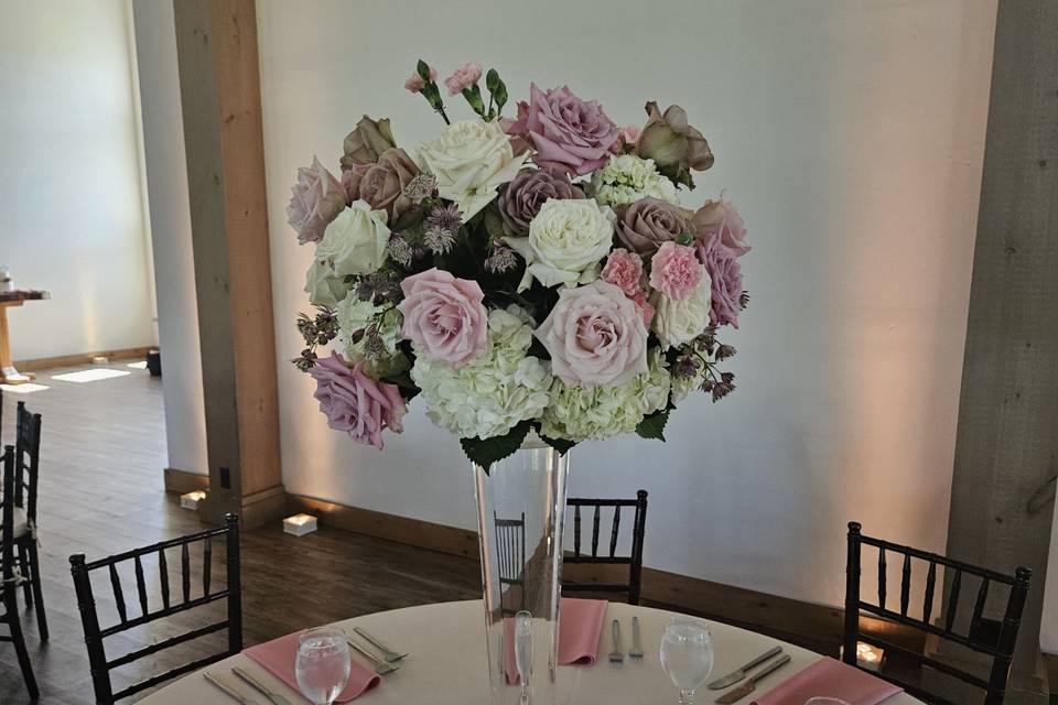 Tall mauve/ivory centerpiece