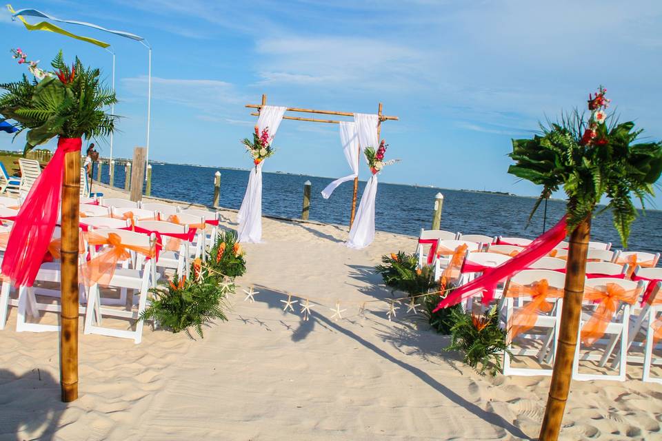 Tropical beach wedding on Best Western beach, overlooking the Santa Rosa Sound.