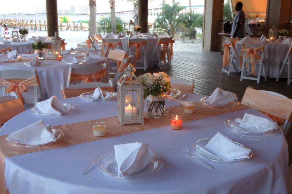 Romantic beach wedding and reception in Paradise Pavilion.