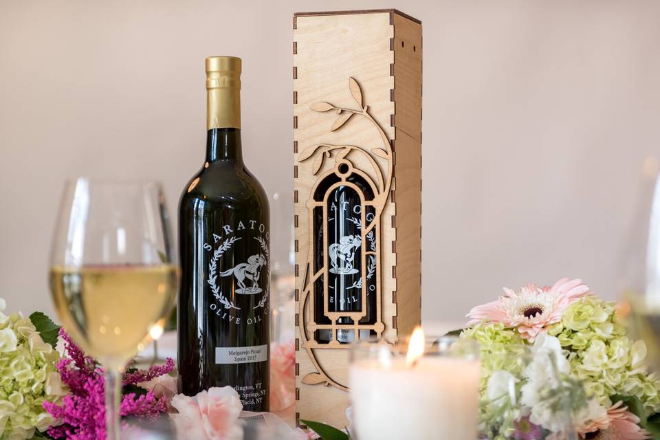 750ml (wine size bottle) plus elegant wooden box. Great gift for your wedding party or anyone who made your day special!