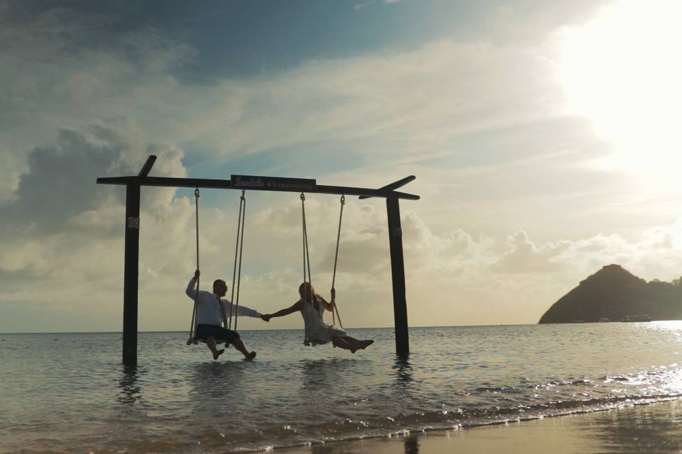 Couple on a swingset