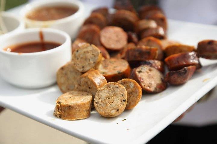 Assorted sausage bites with dipping sauces