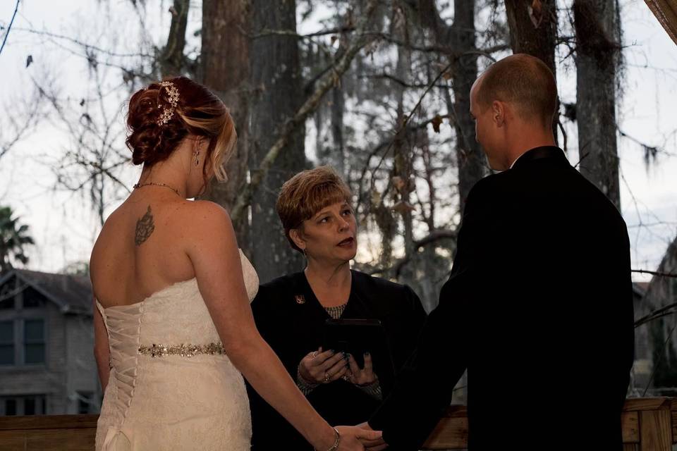 Newlyweds with the officiant