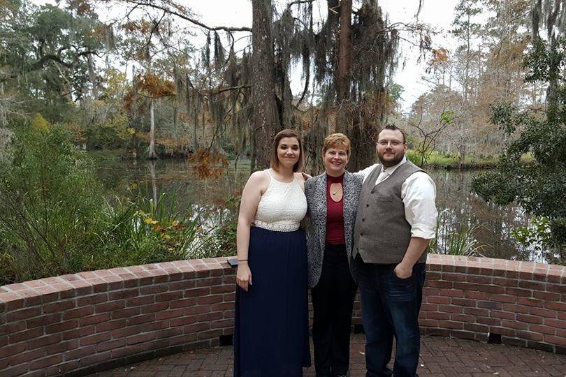 Newlyweds with the officiant