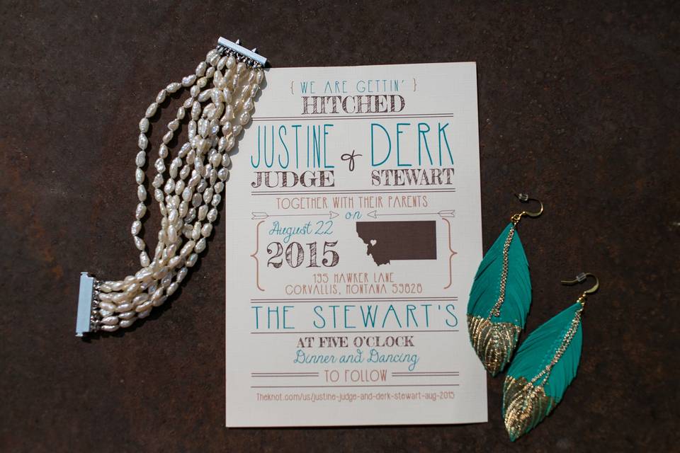 Turquoise, gold, and brown wedding invitations for a country wedding.
