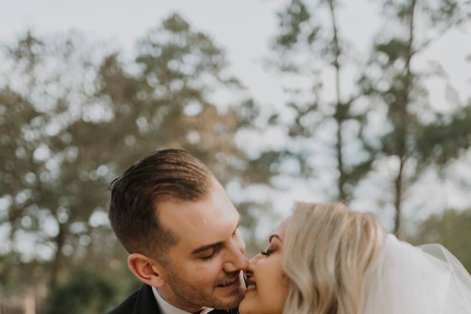 A gentle kiss Bride and Groom